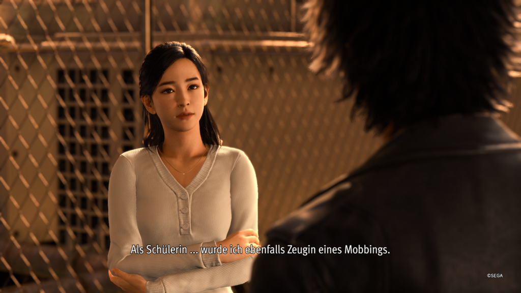 Screenshot einer Cutscene in der Yagami mit Sawa-sensei über Mobbing spricht