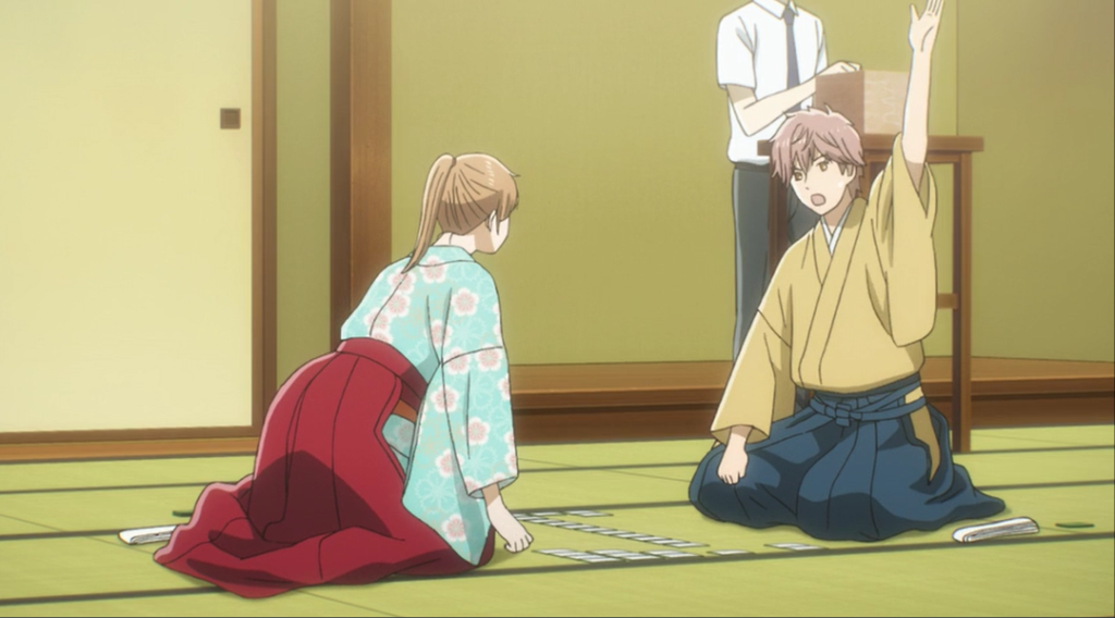 Screenshot aus dem AnimeChihayafuru von Charakteren beim Karuta spielen